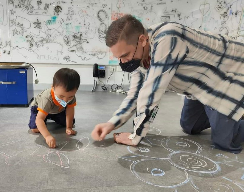 Chalking up a storm with one of the smallest artists at Stonehill in Bangalore after returning to campus after two years of Lockdown.